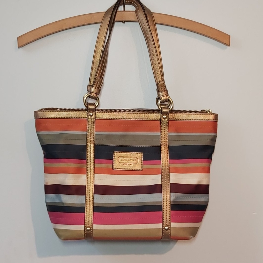 Gold leather trim coach purse